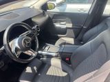 the interior of a car with a steering wheel and a dash board