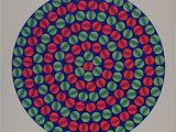 une image représentant un motif circulaire composé de cercles rouges, verts et bleus
