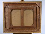 an old wooden easel with a painting on top of it