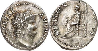 a silver coin with an image of a man holding a sword