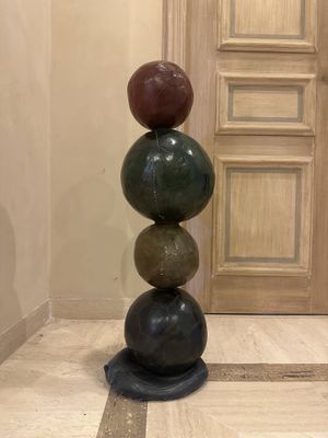 a tall sculpture made of rocks on top of each other