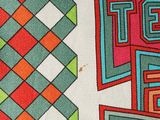 a close up of a tie with a design on it