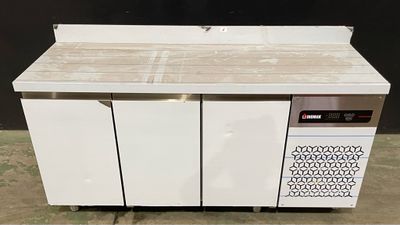 an image of a kitchen counter with a microwave on it