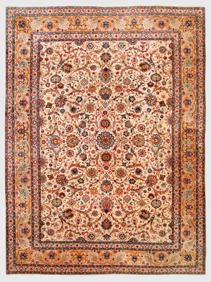 an antique persian rug with a floral design