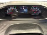 a close up of a car dashboard with a speedometer and gauges