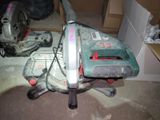 a vacuum that is sitting on the floor in the room