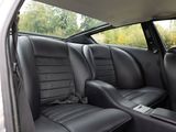 two seats in the back of a car that are black