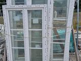 three windows that are stacked up on a pallet