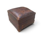 an old leather ottoman on a white background with a white background