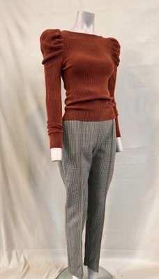 an image of a mannequin wearing a brown sweater and grey pants