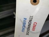 a label on a piece of paper that is hanging from a machine