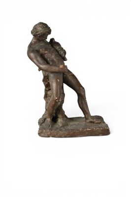 bronze statue of a man holding a bird on a white background