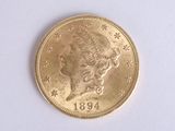 an image of a close up of a coin on a white surface