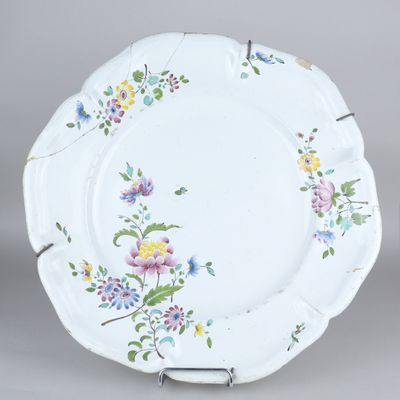 an image of a plate with flowers painted on it