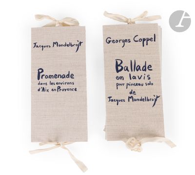 two bags with writing on them sitting next to each other