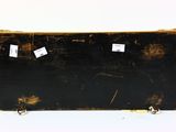 a black suitcase with stickers on it sitting on a white surface