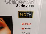 the box is open on a table with a television on it