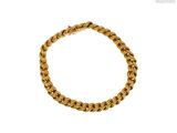 une image d'un bracelet en or sur fond blanc