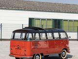 a red bus parked in front of a white building