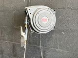 an image of a water heater attached to a brick wall
