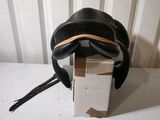 a box with a pair of scissors and a pair of headphones on it
