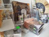 many different items on the counter in this room