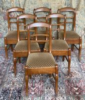 Suite de six chaises Restauration à barrette en merisier, le…