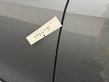 a close up of a sticker on the door of a car