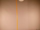 a lamp that is sitting on a table in a room