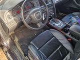a view of a car ' s interior from the passenger seat