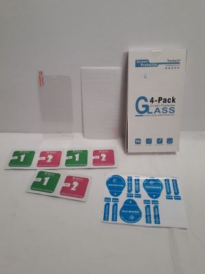 une boîte d'autocollants posée sur une table