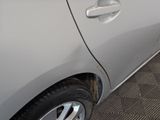 a close up of a car door handle and the door handle is missing