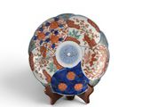 a plate that has a blue and orange design on it