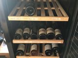 a wine rack with many bottles of wine in it