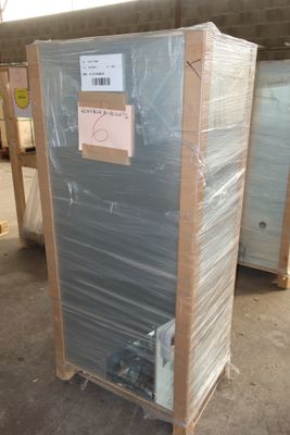 a large box of plastic material sitting on a pallet in a warehouse