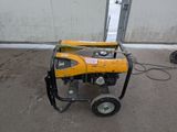 a small generator that is sitting on the ground