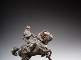 une image représentant une statue en bronze d'un homme à cheval