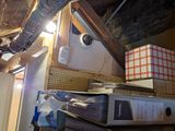 a picture of a room with a bunch of books on the shelves