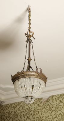 a chandelier hanging from the ceiling in a room