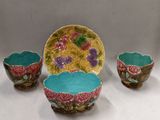 three bowls and a bowl with flowers on them