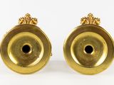 pair of antique brass candlesticks with lion heads
