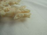 some macaroni and cheese is laying on a white cloth