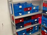 many baskets on the shelves in the room