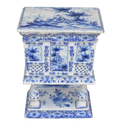 an image of a blue and white table with a shelf on top of it