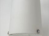 a white lamp hanging from the ceiling in a room