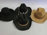 several hats are lined up on a white surface