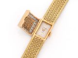an 18 carat gold ladies ' s wrist watch