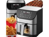 an air fryer with a basket of fries next to it
