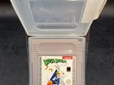 un jeu Nintendo dans un boîtier en plastique posé sur une table