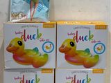 three boxes of baby duck inflatables are stacked on top of each other
